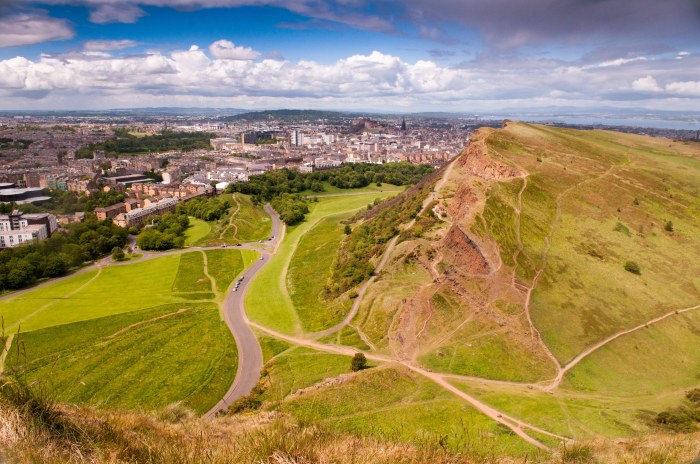 Seat arthur park holyrood edinburgh scotland arthurs sleeping legend dragon stock closed vehicles road